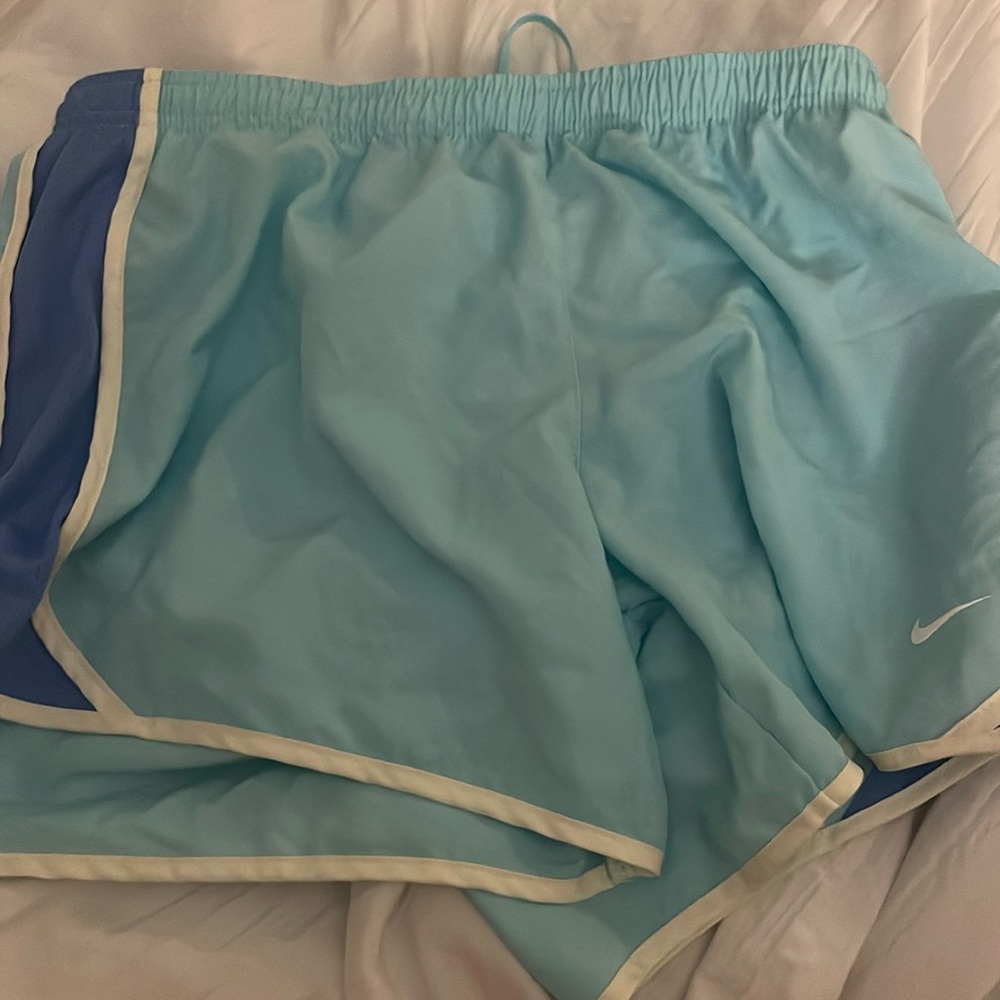 Blue Nike running shorts, size extra large youth.